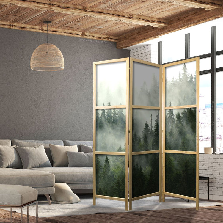 a 3 panels room divider with forest in the mountain design printed on a it canvas, the folding screen is in a modern rustic style living room next to gray sofa and dark gray wall