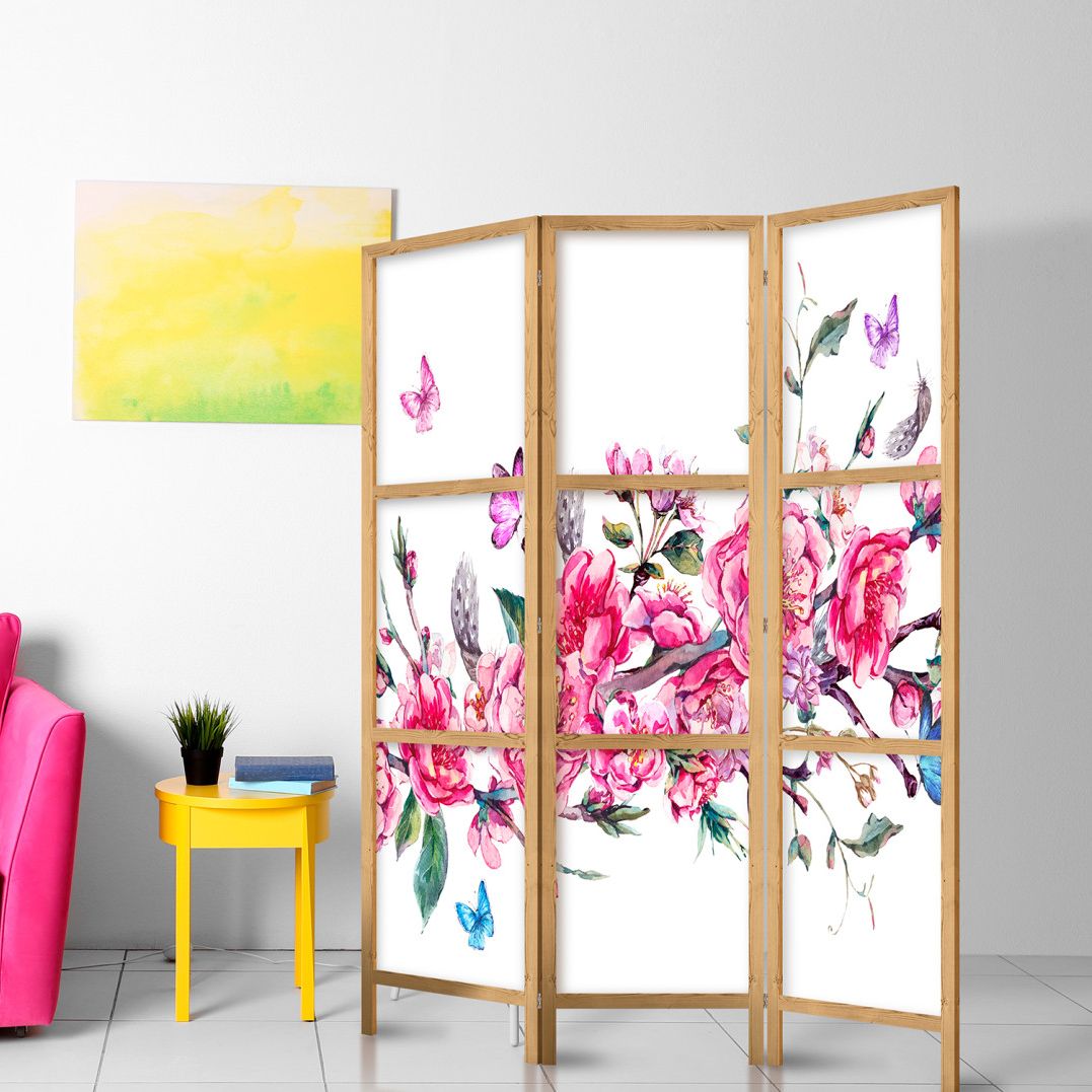 a floral design japanese room divider screen with 3 panels in a small living room next to a canvas print and a table in yellow
