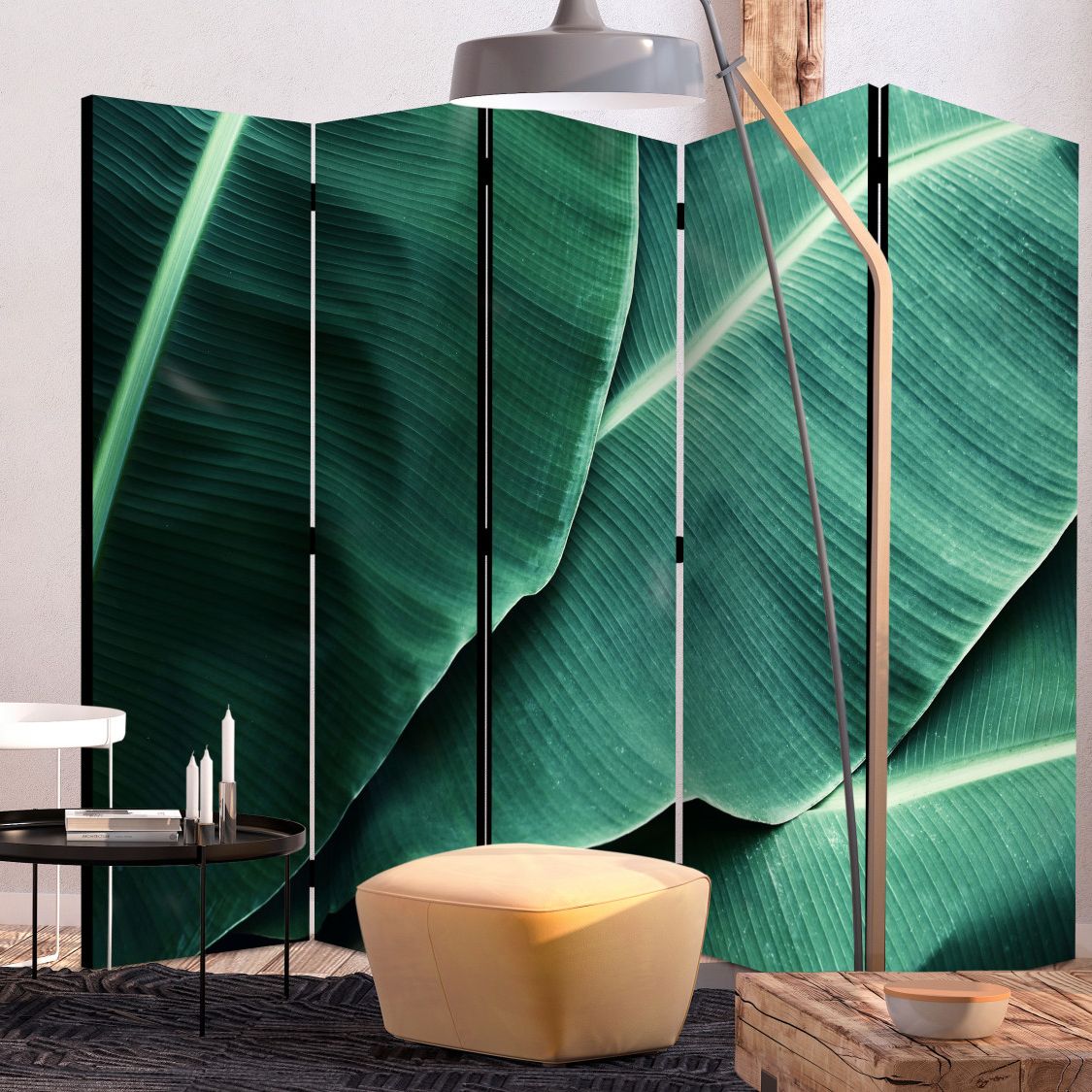 you can see a 5 panels room divider screen with banana leaf design in a living room next to a tall lamp in a living room