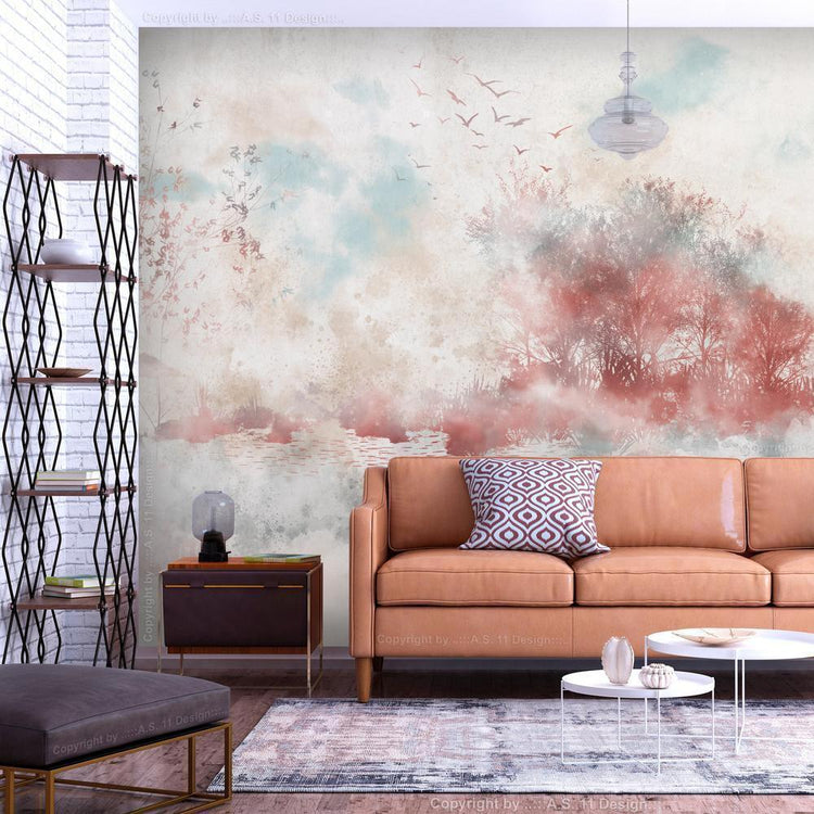 A living room with a brown couch and a colorful watercolor mural on the wall.