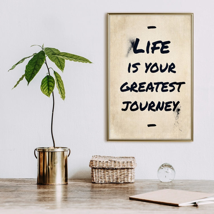 a poster frame with a motivation quote "life is your greatest journey" and a plan beside it