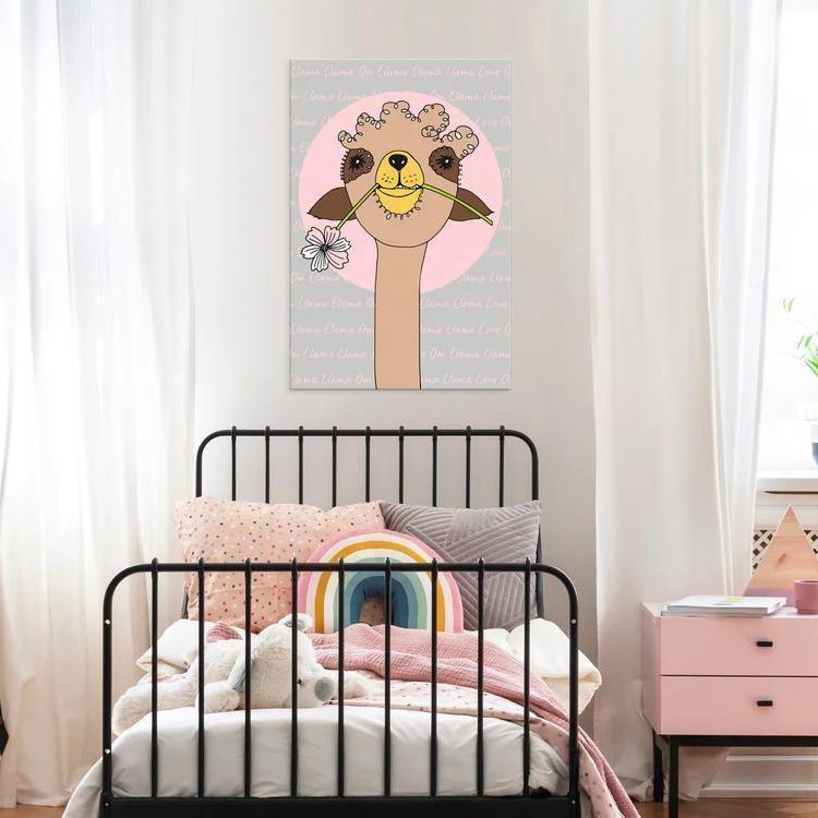 a beautiful canvas print for nursery room featuring a giraffe illustration holding a flower