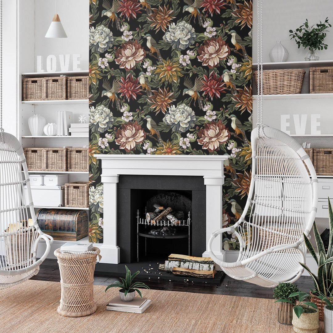 A cozy and stylish living room with a floral wallpaper accent wall, a white fireplace, and modern hanging chairs.