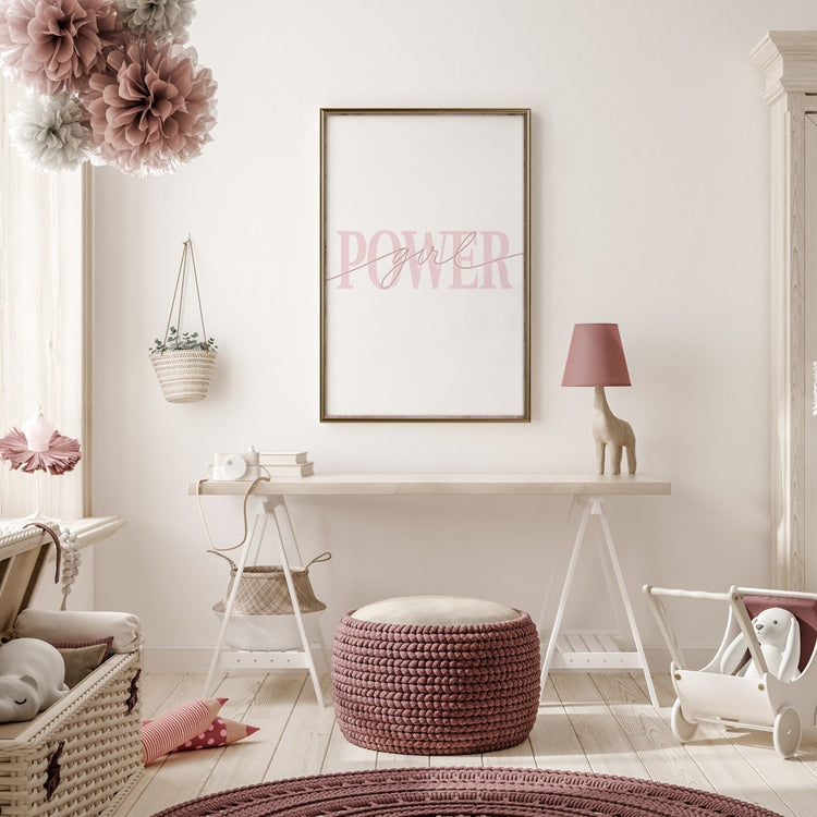 The standout feature is a large framed artwork on the wall displaying the word "POWER" in a delicate, cursive-style pink font, creating an empowering and motivational focal point.