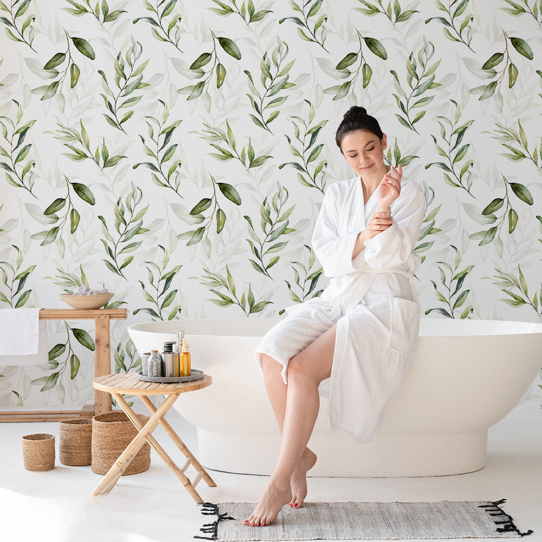 a wallpaper in a bathroom and a woman enjoying her time there